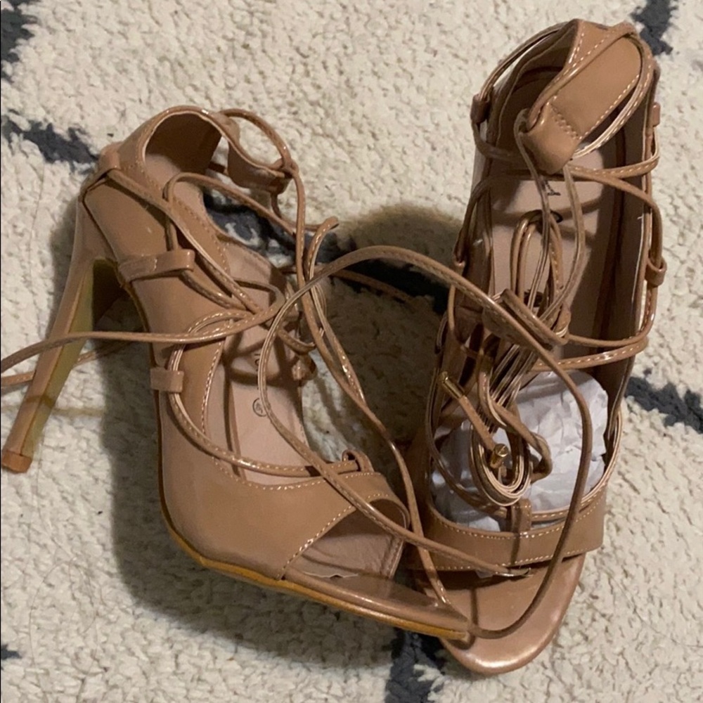 Brand new size 7 criss cross heels